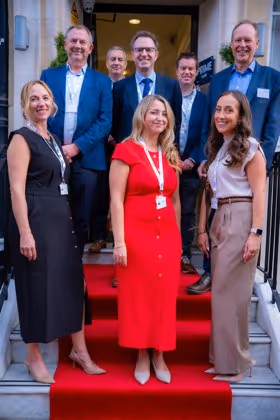 Cutting the ribbon at 45 Queen Anne Street