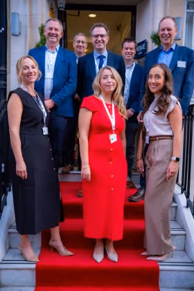 Cutting the ribbon at 45 Queen Anne Street