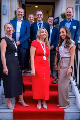 Cutting the ribbon at 45 Queen Anne Street