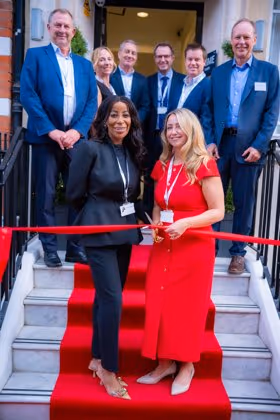 Cutting the ribbon at 45 Queen Anne Street